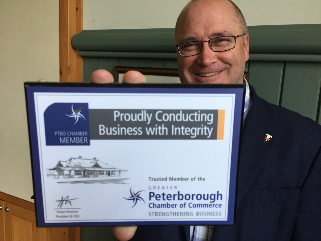 Stuart Harrison with Peterborough Chamber Member plaque: 